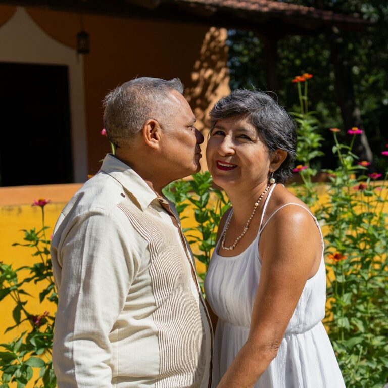 Loving couple smiling together, outdoors.