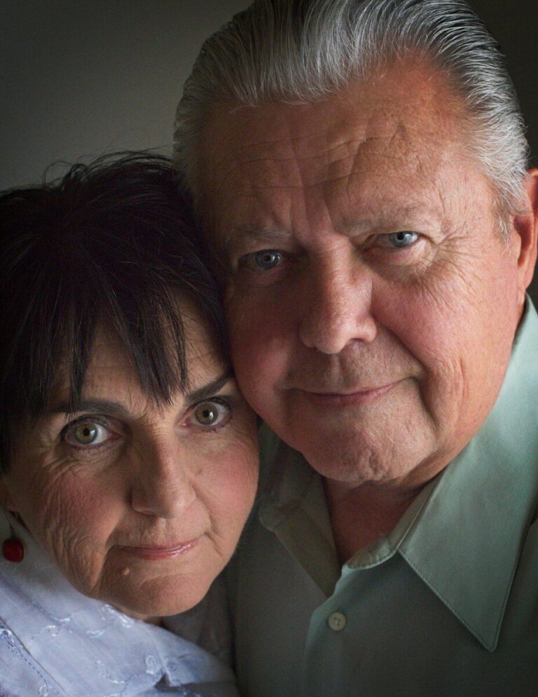 a man and woman taking a selfie