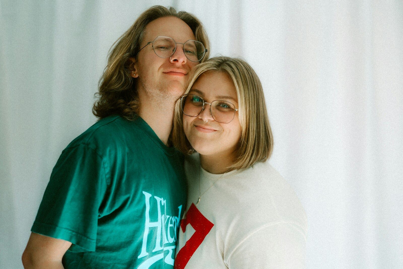 Two people smiling together